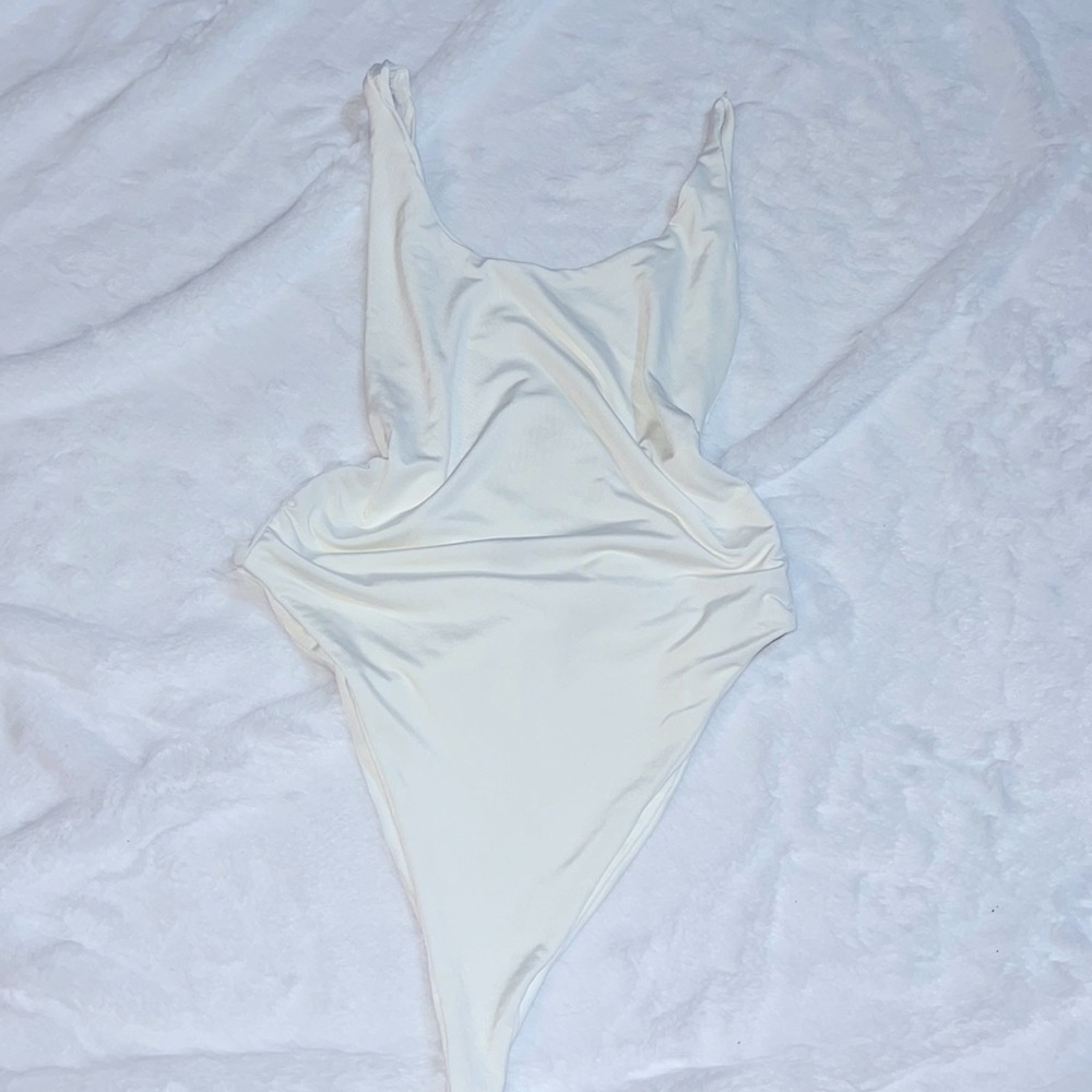 Naked wardrobe one piece bathing suit
